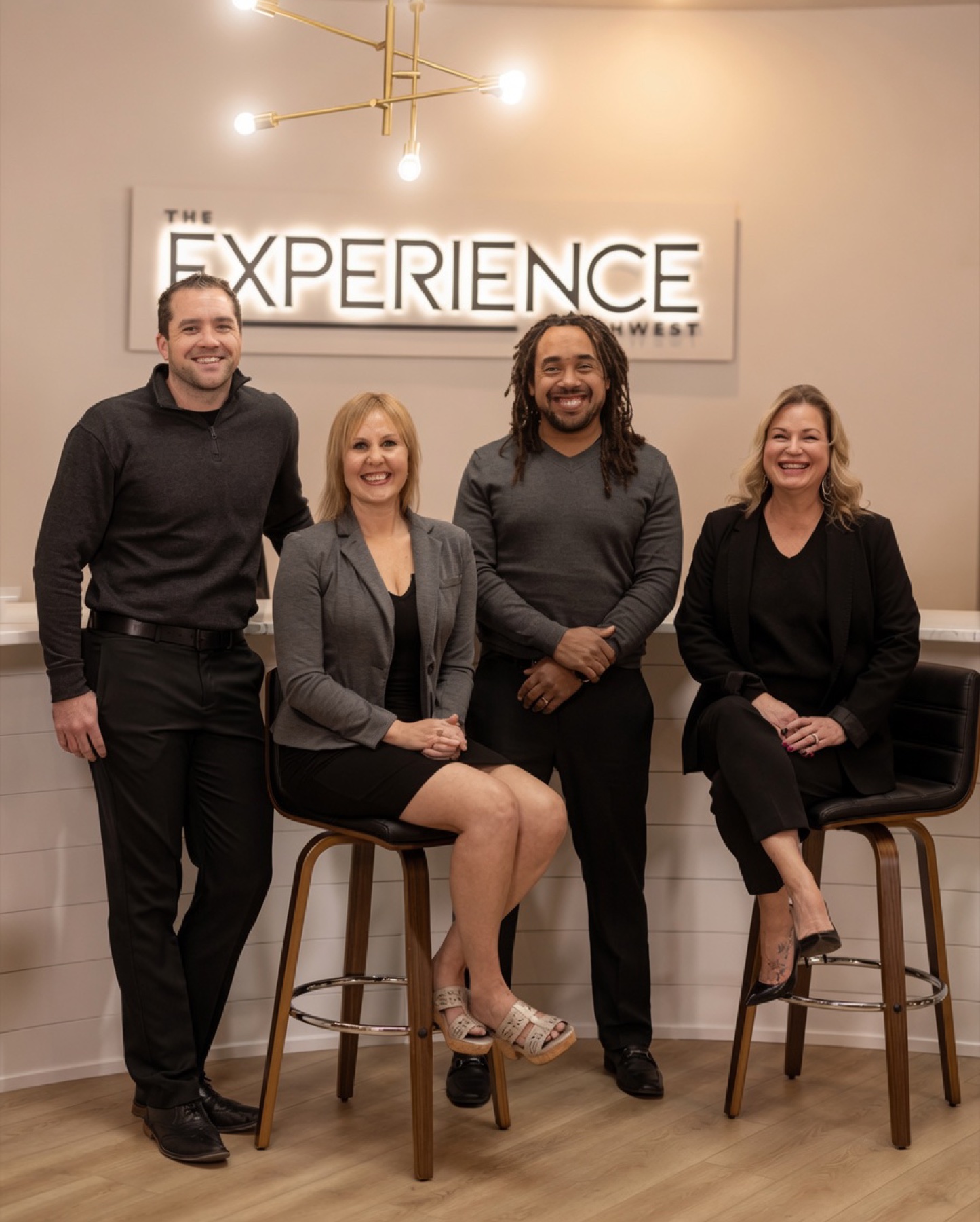 RD Means with the REI Realty team at The Experience Northwest office